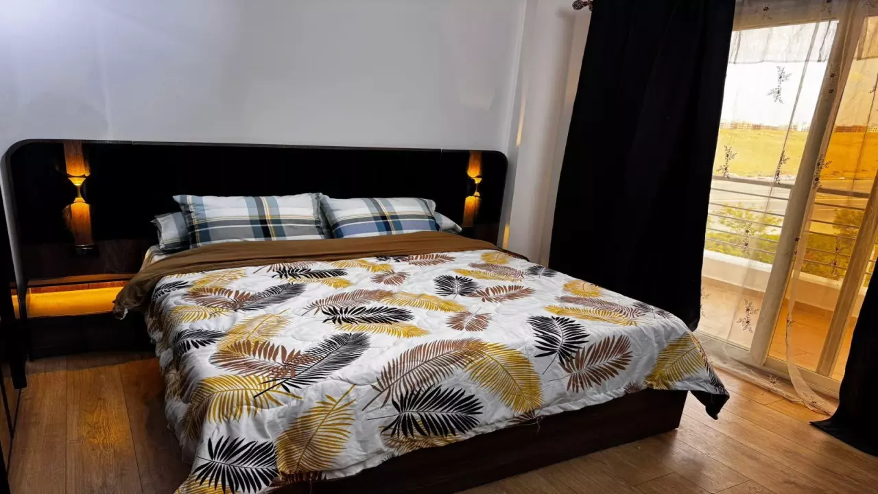 Fully Furnished Luxury Apartment  3 Bedrooms  Dar Misr Qoronfel image 4
