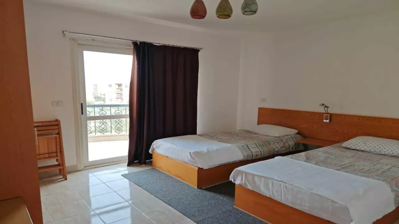 Stylish 2BR Apartment in Rehab City  Prime Location  Garden View image 3