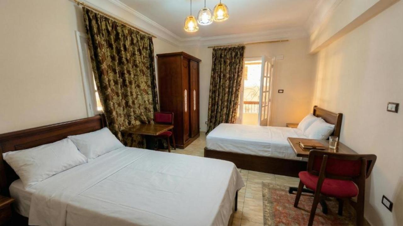 Elegant 3Bedroom Apartment with Living Room and Terrace Near Fustat Landmarks image 3