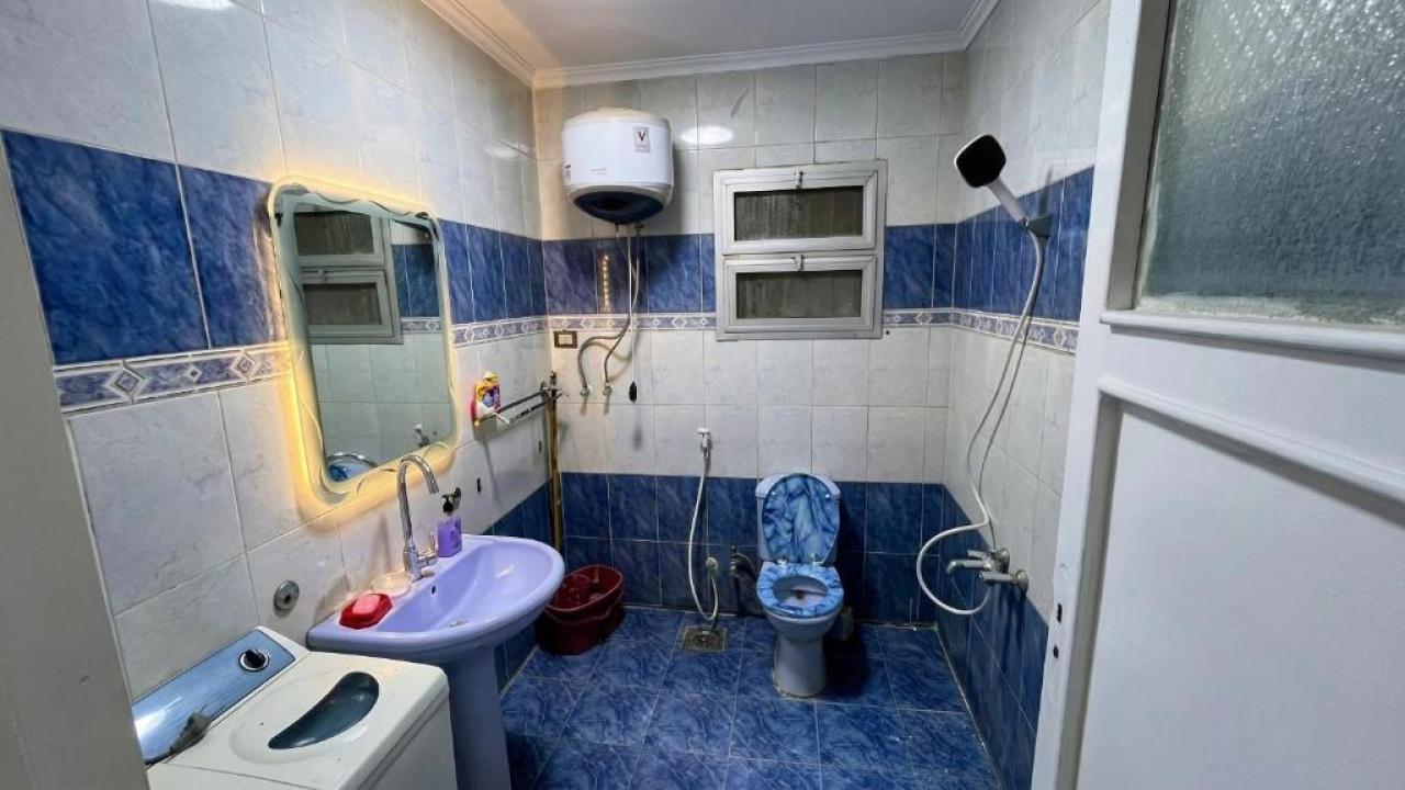 Elegant 3Bedroom Apartment with Living Room and Terrace Near Fustat Landmarks image 5