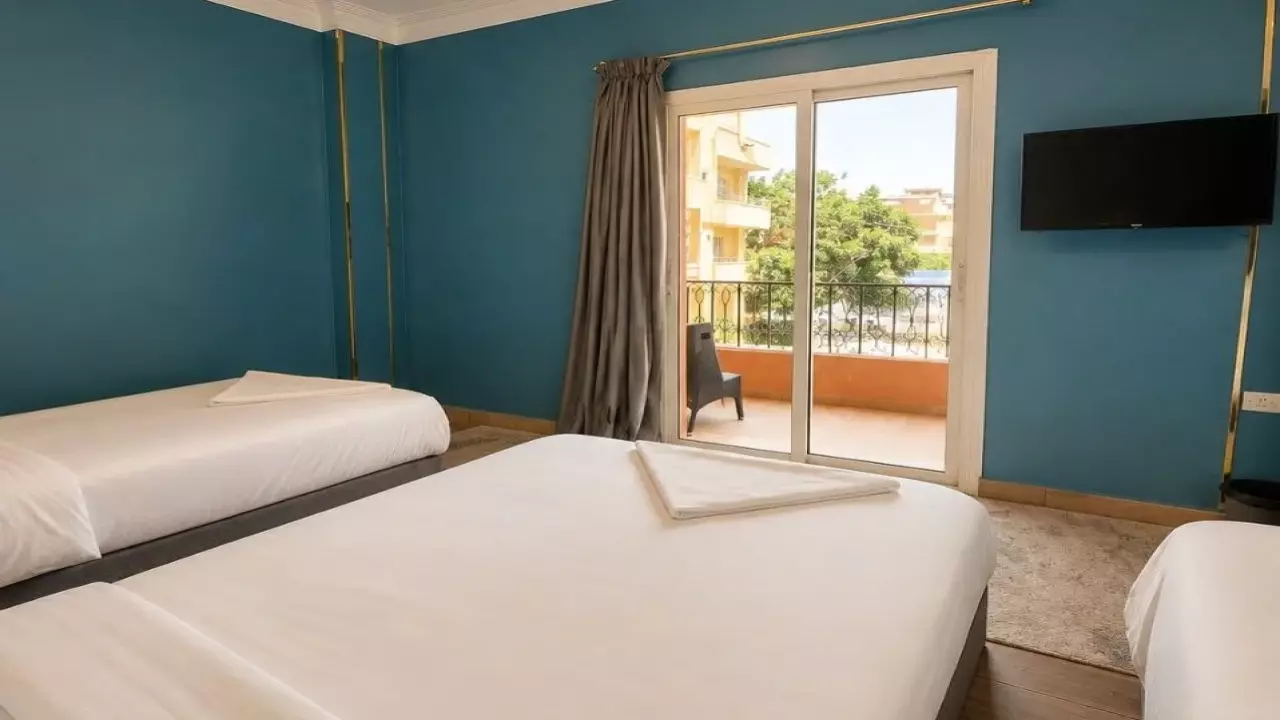 Giza  Pyramids Apartment accommodates up to 4 guests with a stunning view of the pyramids image 3